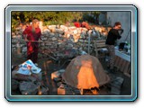 086-shoveling the hot coals under the kiln
