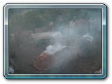 094-Tasos covering the bottom of kiln with soil to close gap